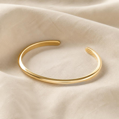 Étoile Cuff Bracelet on cream linen