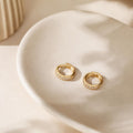 Celeste Hoop Earrings on cream ceramic