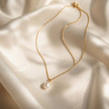 Lumière Pearl Necklace on ivory silk